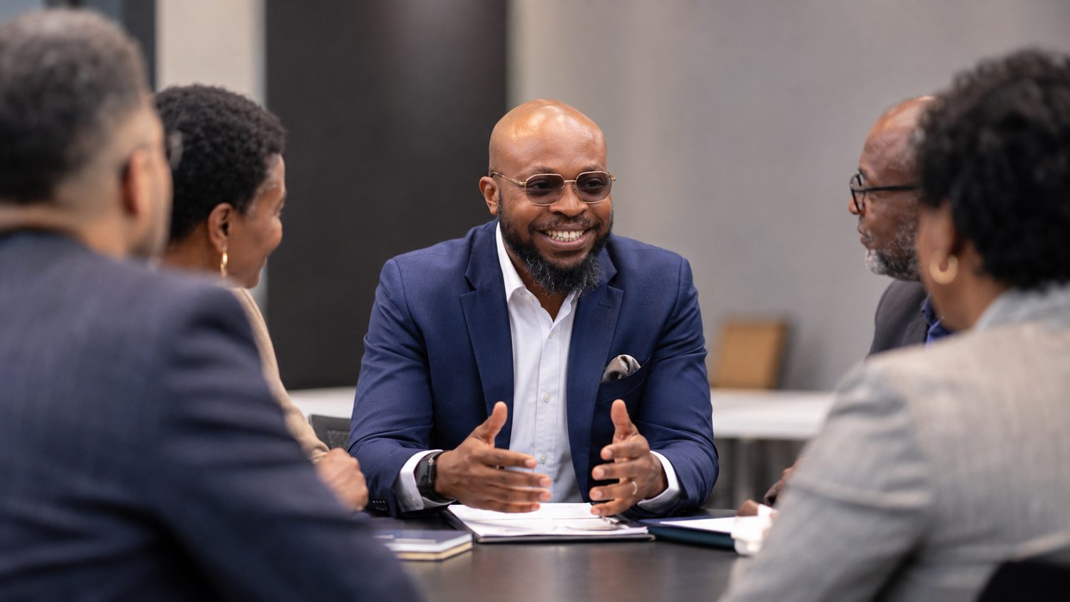 Blaise Itabelo contributing to a corporate roundtable discussion